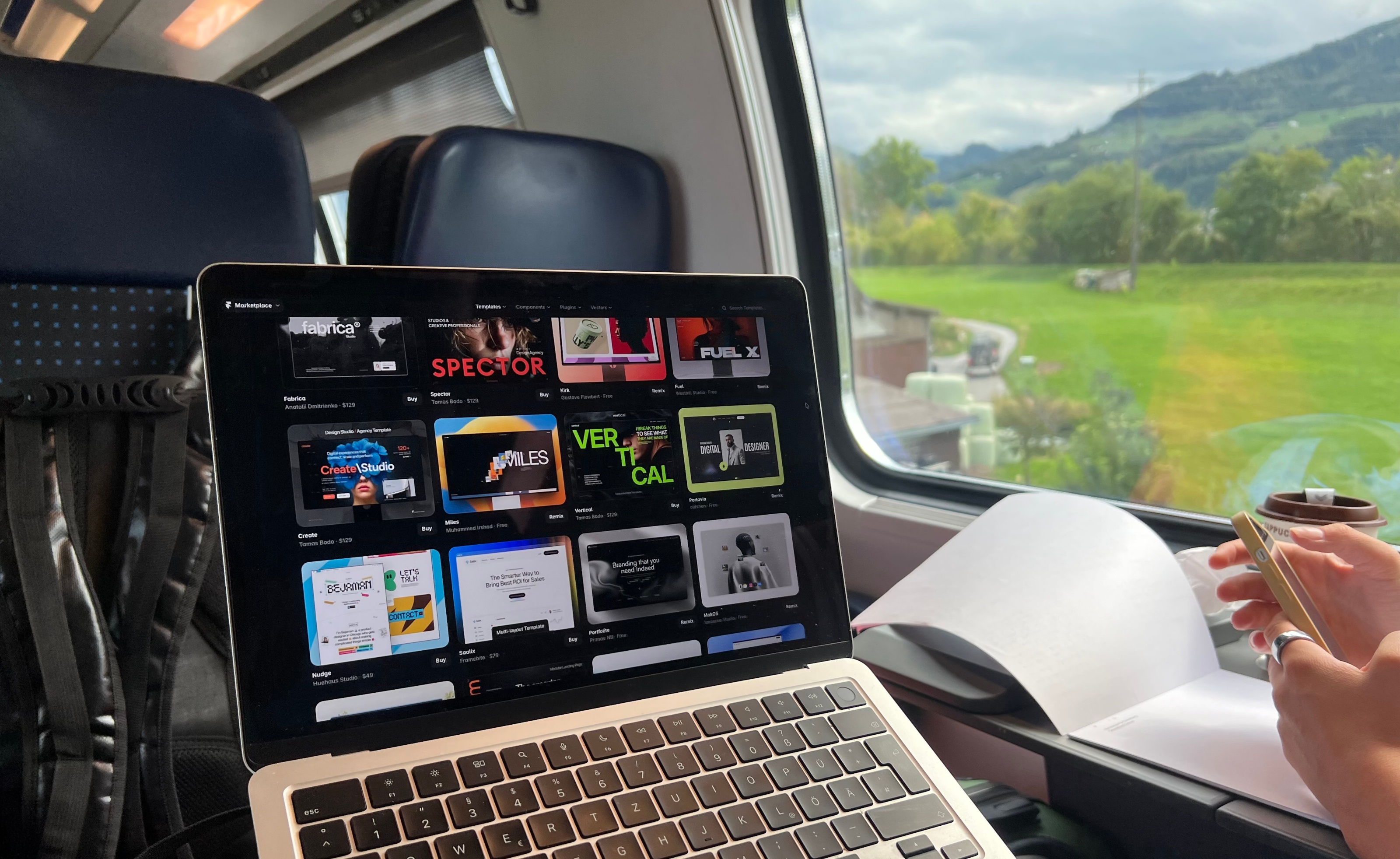 Work setup for today 🚆🏔🇨🇭Travelling through Switzerland by train, laptop open and probably one of the best office views you can get.